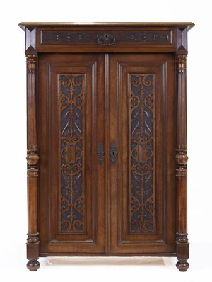 A Victorian walnut cabinet, third quarter 19th century, with single drawer, above two fret work...