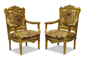 
	
		A pair of Louis XVI giltwood fauteuils, early/mid 20th century, the square pierced backs...