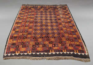 
	
		An Afghan Kelim, the brick field with symmetrical field design, enclosed by geometric...