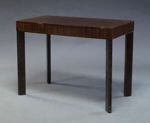 
	
		An Art Deco rosewood desk, retailed by Nordiska Kompaniet, Stockholm, c.1930s, the...
