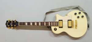
	
		A Rockburn Les Paul style guitar, with 22 frets, two humbucker pickups, three-way pickup...