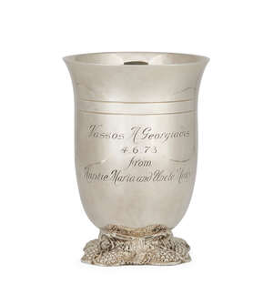 
	
		A silver wine beaker, London, c.1971, Garrard & Co., raised on a quatrefoil foot...