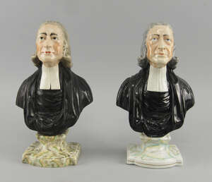 Two Staffordshire pottery models of John Wesley, 19th century, 29cm high (2)
		 