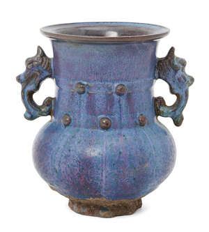 
	
		A Chinese stoneware archaistic junyao vase, late Qing dynasty, with broad flared mouth...