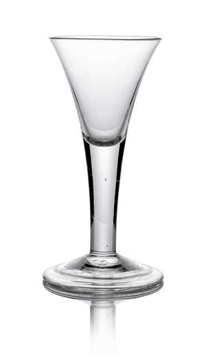 A George III drinking glass, with trumpet form bowl, on plain tapering stem, with circular fold over foot, 16cm high