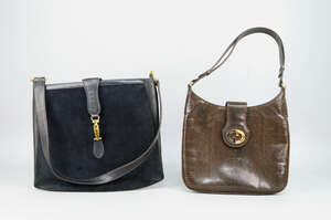
	
		A Gucci brown lizard skin handbag, with adjustable strap, 28cm wide, together with a...