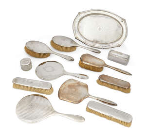 
	
		An eight piece silver-backed vanity set, comprising six brushes and two hand mirrors...