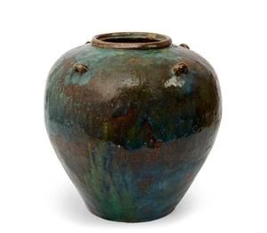 A Chinese Shiwan kiln four-tie jar, 20th century, with an overall blueish green glaze suffused...