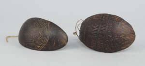
	
		A New Guinea coconut food spoon, the handle finial carved with a facial design of a man...