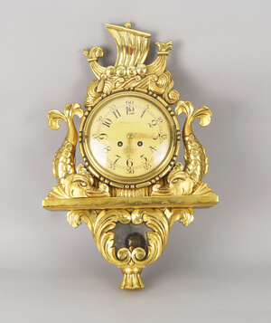 
	
		A Continental giltwood cartel clock, signed to dial, Gosta Hansson, late 20th century,...