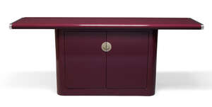 
	
		A burgundy lacquered sideboard, in the manner of Pierre Cardin      
		c.1990    
		The...