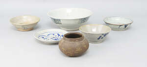 
	
		A Chinese Provincial porcelain dish, 16th/17th century, with sponged decoration to the...