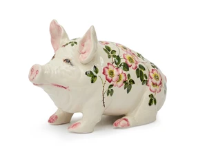 A large Wemyss Ware glazed earthenware pig by Brian Adams, late 20th century, inscribed 'Wemyss Exon Z164 B. Adams', painted in the 'Dog Roses' pattern, modell