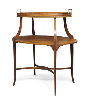 
	
		An Edwardian mahogany and inlaid two tier side table, the removeable oval tray top, on...