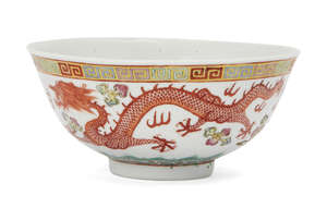 
	
		A Chinese porcelain 'dragon and phoenix' bowl, Guangxu mark and of the period, painted to...
