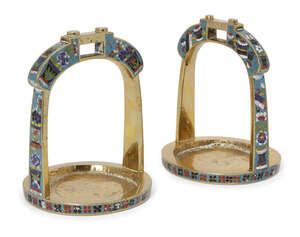 
	
		A pair of Japanese polished bronze and cloisonné stirrups, late 19th century, decorated...