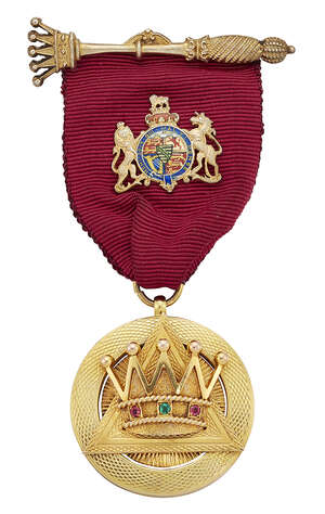 
	
		A 9ct gold Masonic jewel, for the Albany Chapter, the engine turned circular panel with...