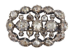 
	
		A late 18th century  diamond brooch, of oval openwork design set with rose cut diamonds...