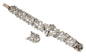 
	
		An early 19th century silver and foiled paste bracelet, composed of graduated openwork...