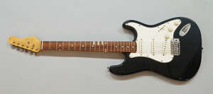 
	
		A left-handed Squire Strat by Fender guitar, with 22 frets, volume and tone knobs,...