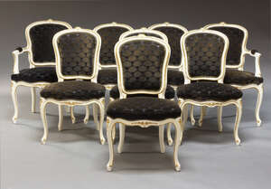 
	
		A set of eight Louis XV style white and parcel gilt dining chairs, late 20th Century,...