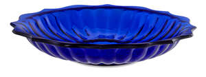 
	
		A Chinese Peking blue glass lotus dish, late Qing dynasty, with shaped rim and lobed...