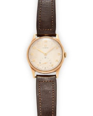 Omega. A 9ct gold manual wind wristwatchCase number 13322, Movement number 12617388, Birmingham hallmark for 1951Jewelled manual wind movement, silvered dial w