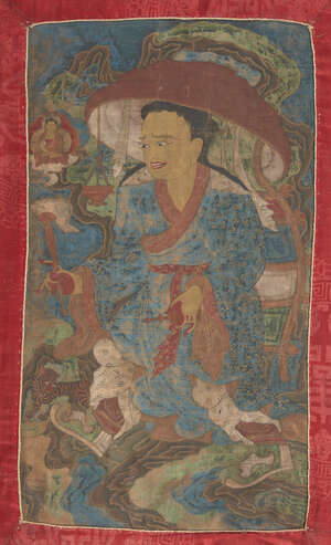
	
		A Tibetan silk mounted Thangka, 19th century, depicting an Arhat holding a scroll and a...
