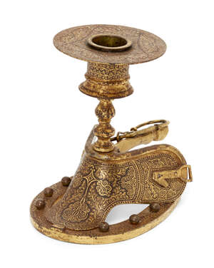 
	
		A koftari work steel candlestand in the form of a saddle, North India, 19th century, the...