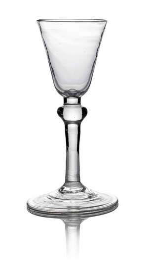 A George III drinking glass, with tapering conical bowl, with plain single knop stem, on spreading fold over foot, 15cm high