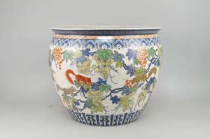 
	
		A Japanese porcelain fish bowl, late 20/early 21st century, decorated to the exterior...