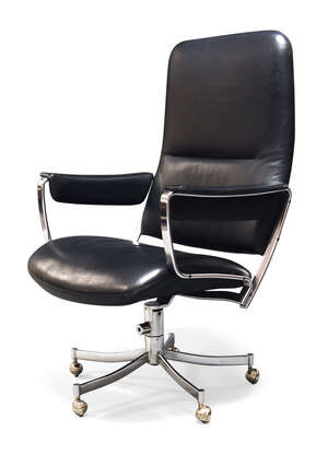 
	
		A black leather and chromed lounge chair, in the manner of Jørgen Kastholm and Preben...