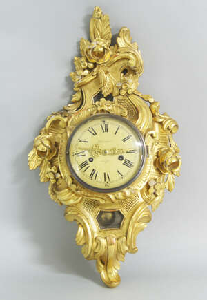 
	
		A Continental giltwood cartel clock, signed to dial, Holmia Stokholm, late 20th century,...