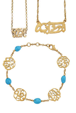 
	
		A motif necklace and two monogram bracelets, the necklace with twist chain and name...