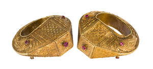 
	
		A pair of gilded white sheet metal cuff bracelets, Indonesia, late 19th/early 20th...
