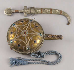 
	
		A Middle Eastern dagger, 20th century, with silver metal and copper mounts, 37cm long,...