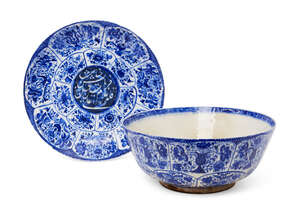 
	
		A blue-and-white inscribed pottery bowl and dish signed by Muhammed, Iran, both dated...
