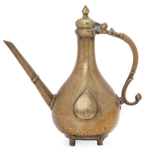 
	
		A Mughal brass ewer, Northern India, 18th century, of pear-shaped form with s-shaped...
