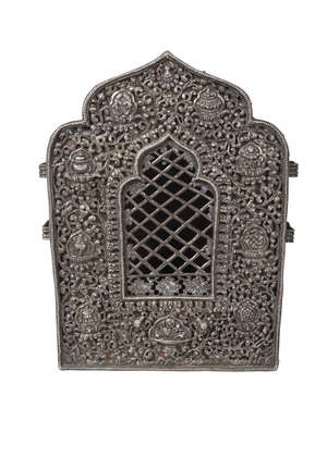 
	
		A large Tibetan copper Gau, 19th century, with silver repousse and pierced front...