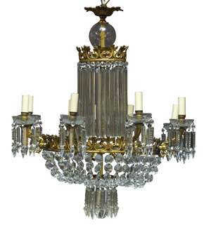 
	
		A cut glass and gilt metal eight light chandelier, early to mid 20th Century, the gilt...