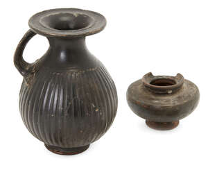 
	
		Two black glazed pottery vessels
		Possibly Greek circa 4th Century B.C. 
		One an...