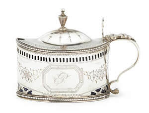 A George III silver mustard, London c.1788, Frances Purton, the body with pierced bands, engraved with garlands and initial to cartouche, blue glass liner, 8.2