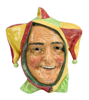 
	
		Royal Doulton, an earthenware wall mask
		'Jester', HN.1630, introduced 1936 withdrawn...
