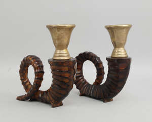 
	
		A pair of modern painted bronze rams horn candlesticks,  naturalistically modelled,...