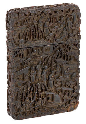 
	
		A Chinese tortoiseshell card case, mid- 19th century, intricately carved with figures in...