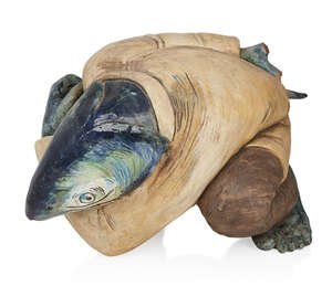 
	
		Pamela Mei Yee Leung (1962-2011), 
		 
		Pottery sculpture of a crouching fish in a...