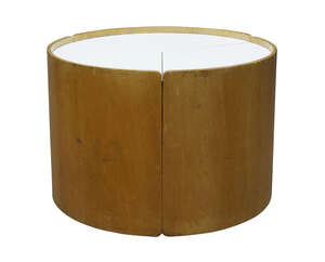 
	
		A laminated beech metamorphic side table / cabinet,
		c.1950,
		of cylindrical form,...