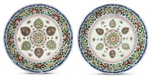 
	
		Two similar Chinese porcelain dishes for the Islamic market, early Kangxi period, painted...