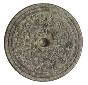 
	
		A large Chinese bronze Tang style circular mirror, 20th century, cast with deities and...