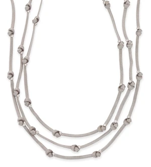 A diamond necklace, composed of three mesh-link chains, with knot motifs, below brilliant-cut...